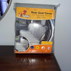 BRAND NEW back seat dog cover in perfect condition, never used.